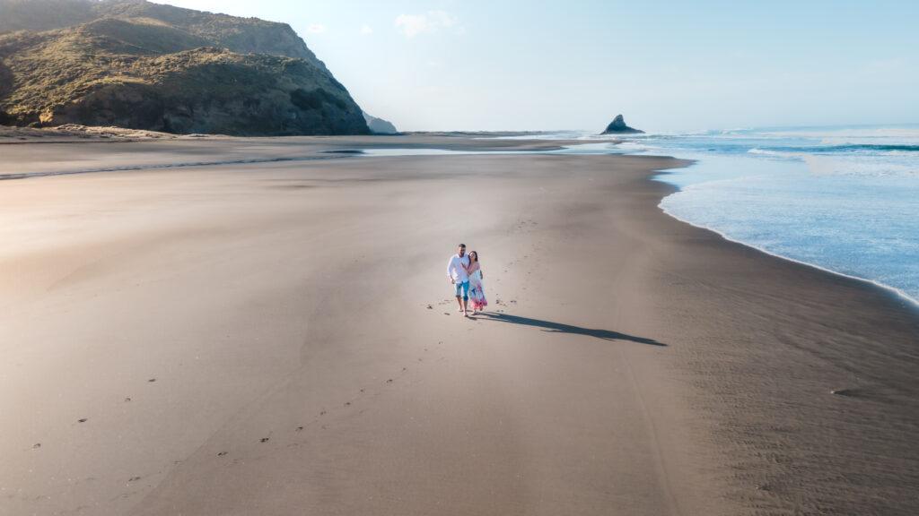 Karekare Beach at sunrise engagement shoot Auckland